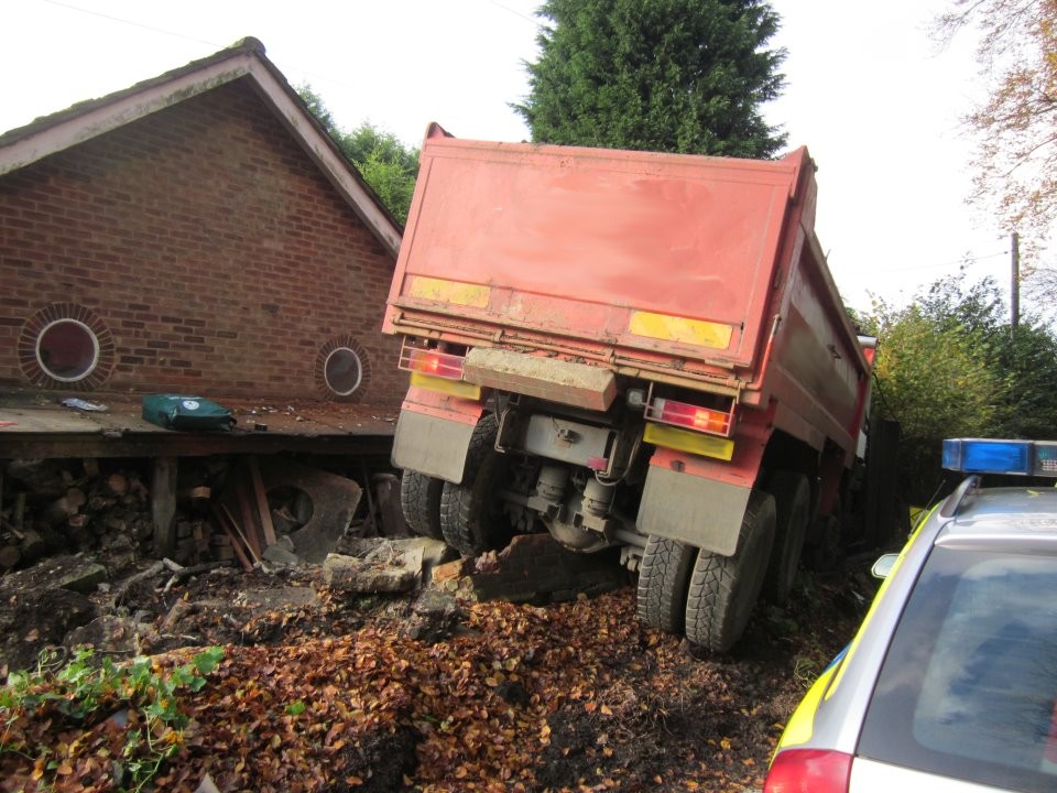 Lorry crashed through garden wall